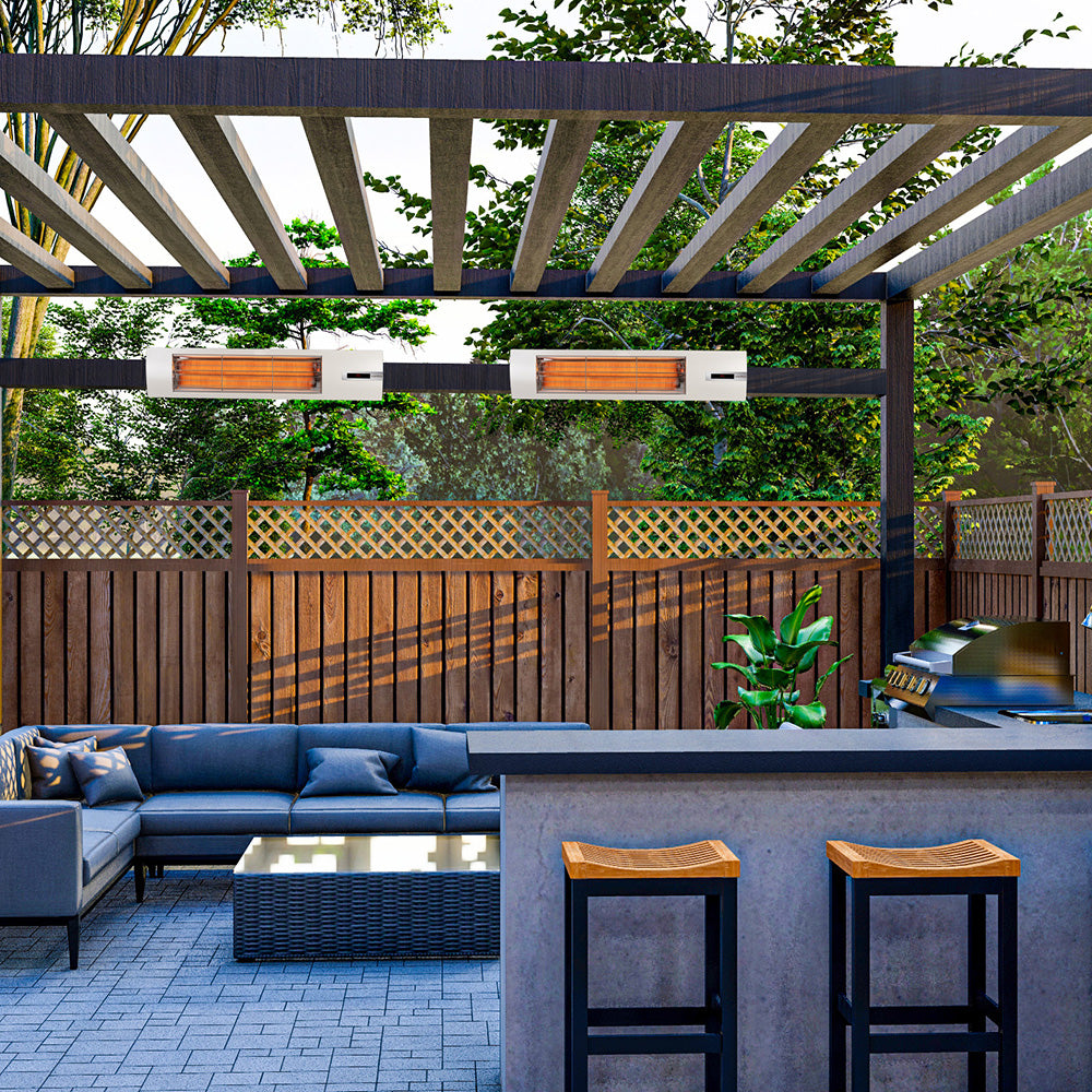 Outdoor patio with blue sofa, bar area, and white infrared heaters under a pergola.