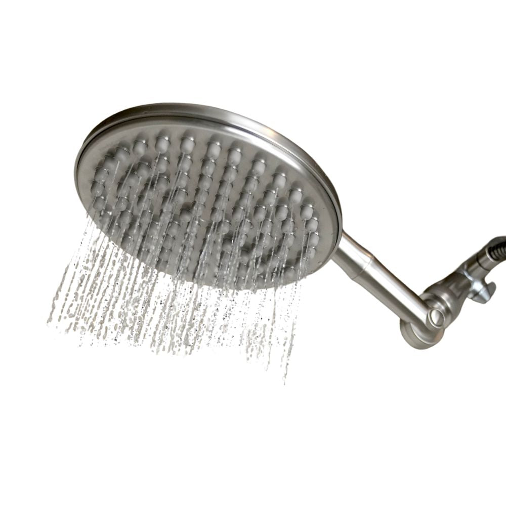 Brushed Nickel shower head with water flowing on a white background