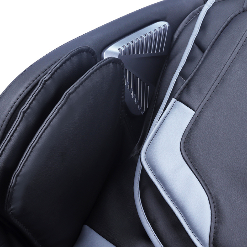 Detailed view of speaker in headrest , also shows stitching view of the BACKplus® 7000 Absolute Massage Chair.