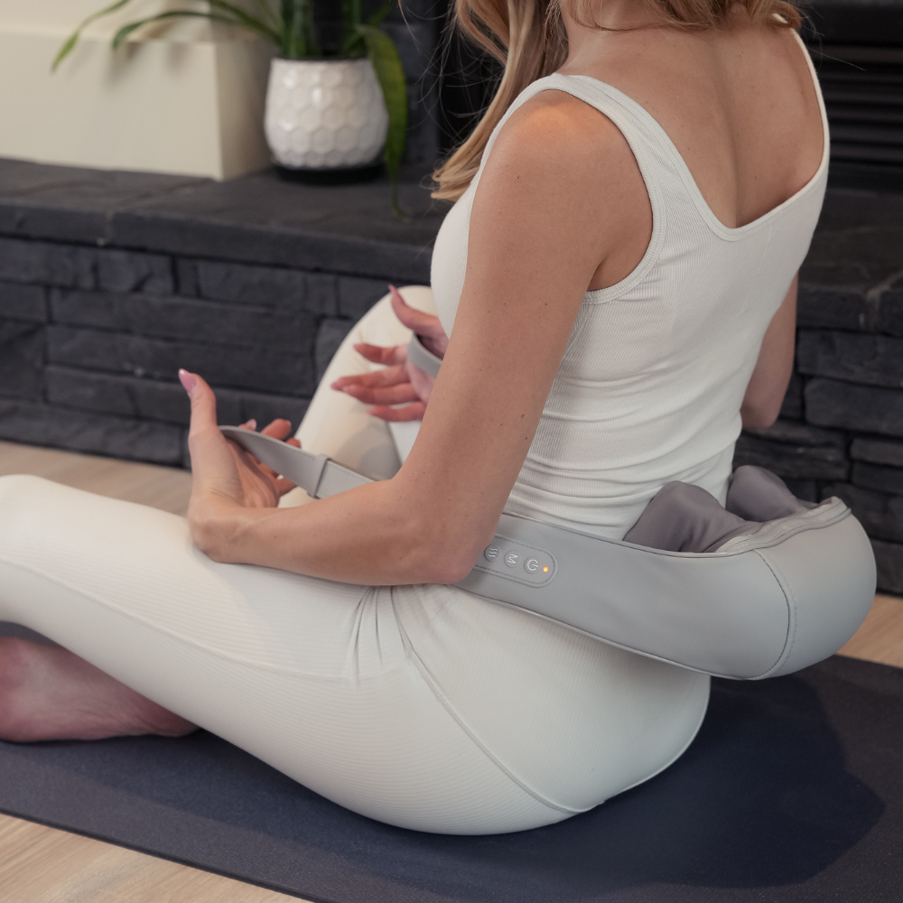 BACKplus® Cordless Platinum Shiatsu Massager Hand Held Body Massager used on lower back.