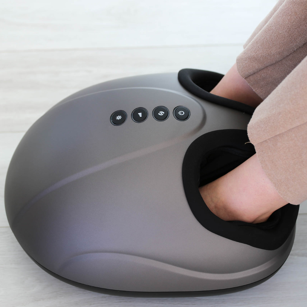 Feet inside BACKplus® Foot Massager