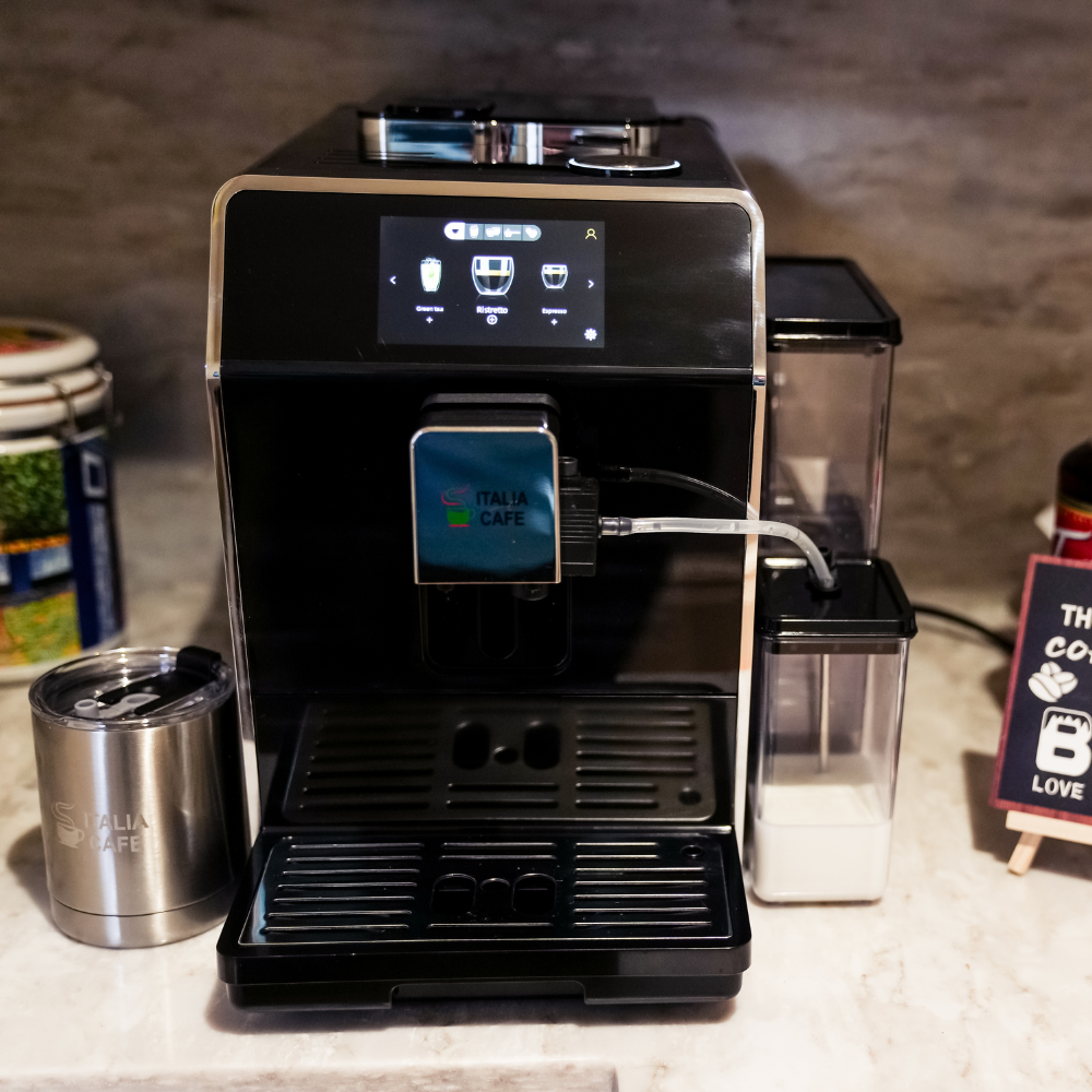 Espresso machine on a countertop with a thermos and sign in the background