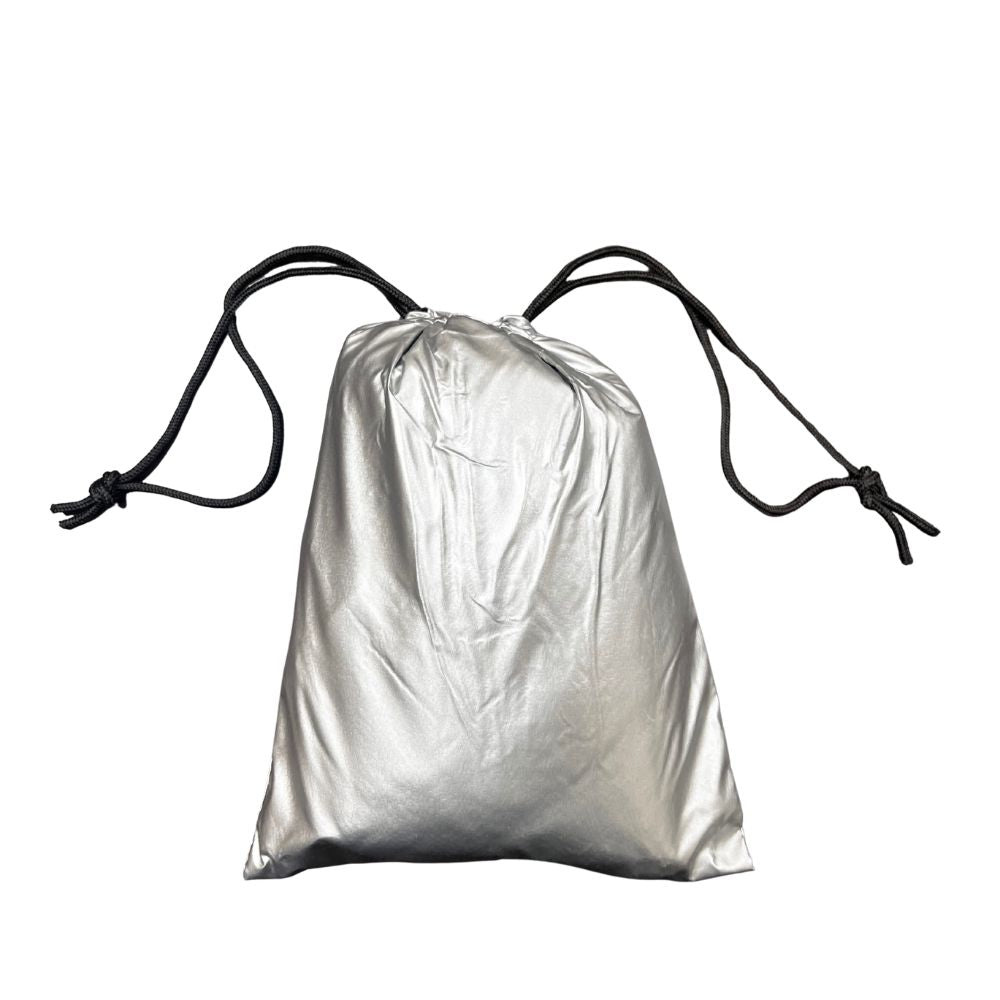 Silver drawstring bag of the Nifty Sac on a white background