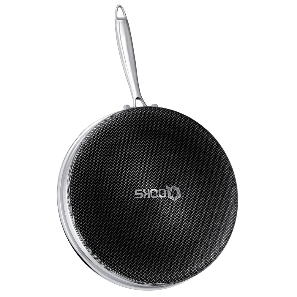 Qooks Cookware bottom of saucepan with logo. Close-up of Qooks pan with contoured, easy-grip handle.