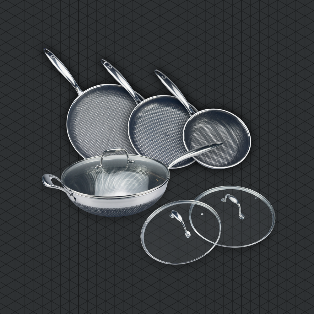 A set of Qooks Cookware Kitchen tools. Qooks non-stick cookware set with stackable, space-saving design.