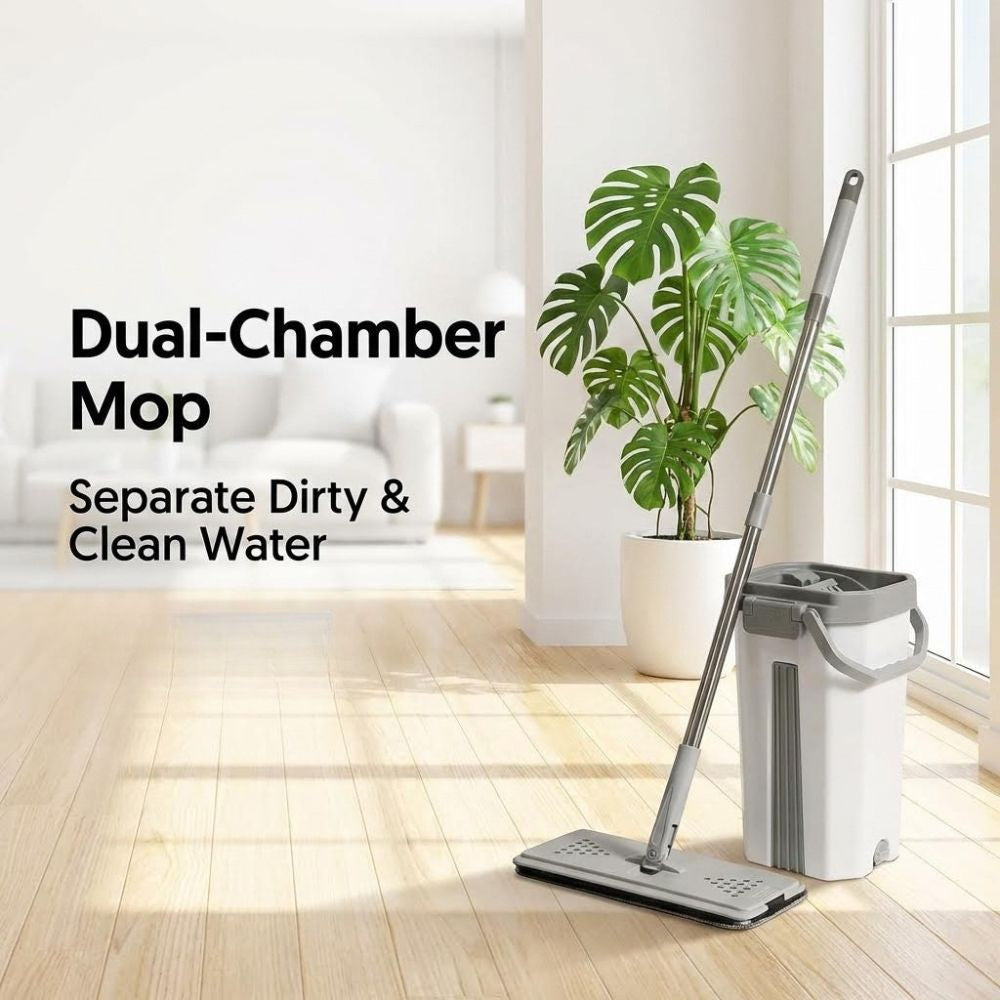 Dual-chamber mop with bucket on a wooden floor in a bright room with a plant.