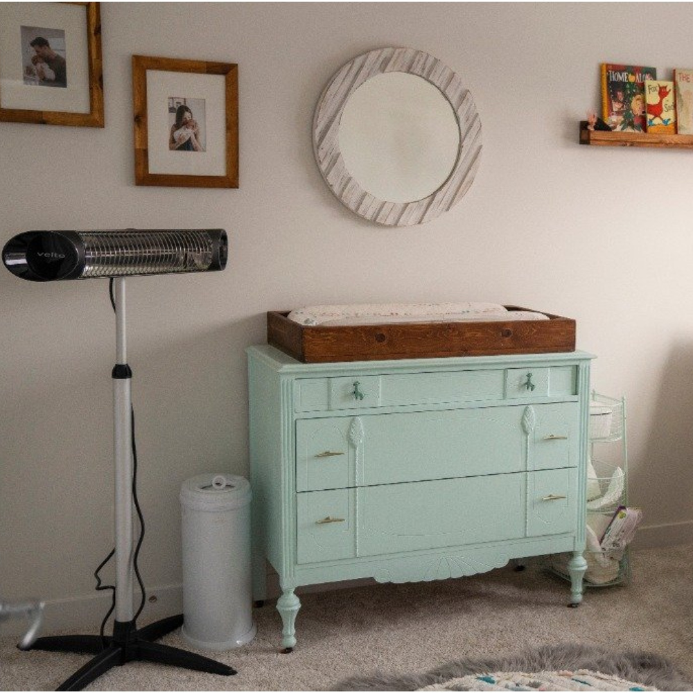 Veito® Blade 1500W Heater Recertified space heater on stand in baby room.
