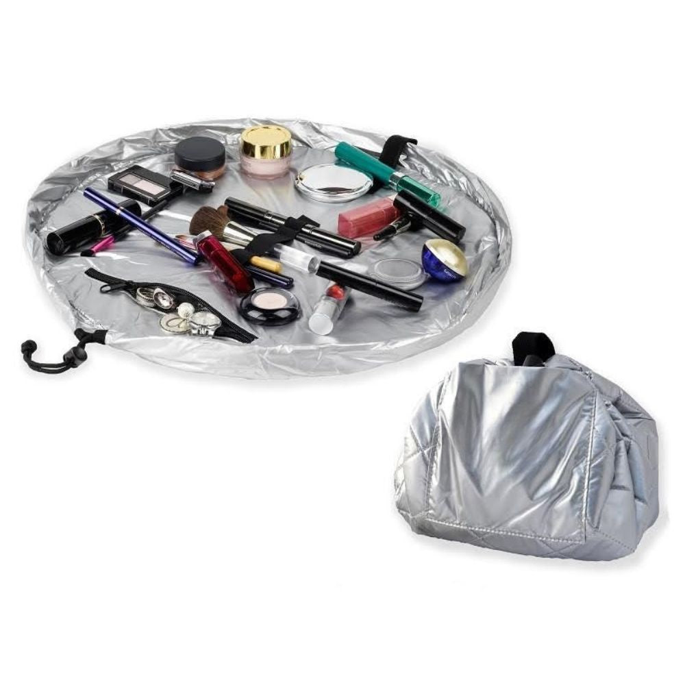 Silver makeup organizer with various cosmetic items on a white background