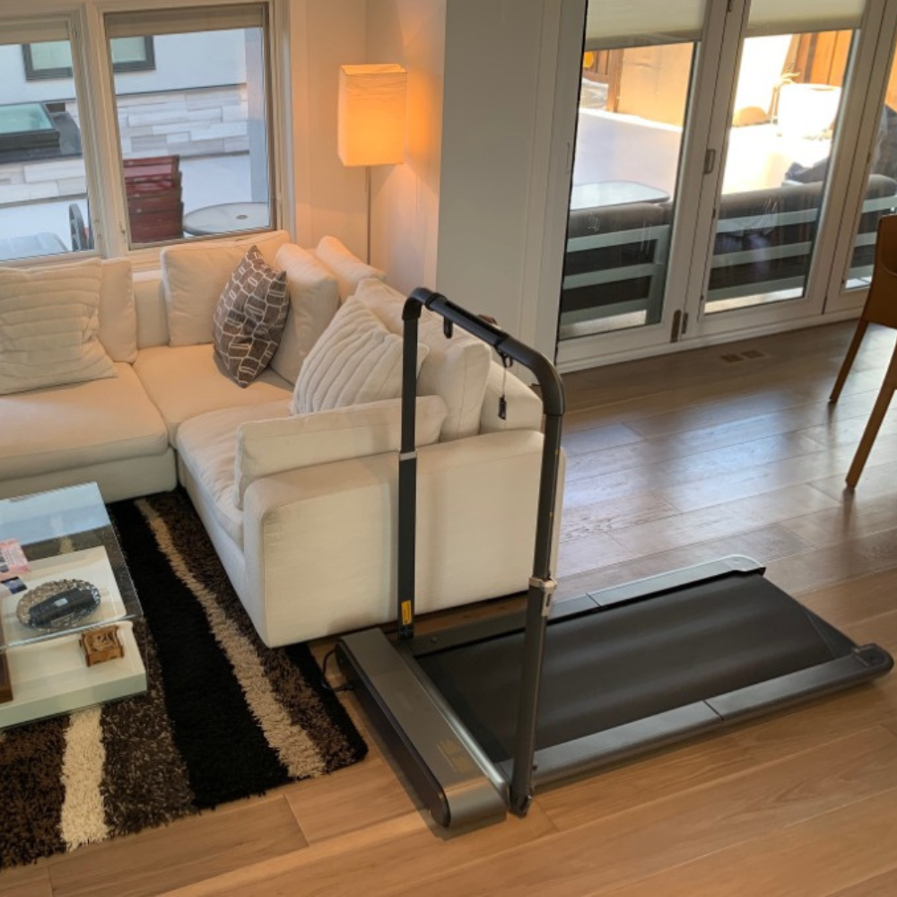 iQ Slim Tread® Foldable Treadmill in living room