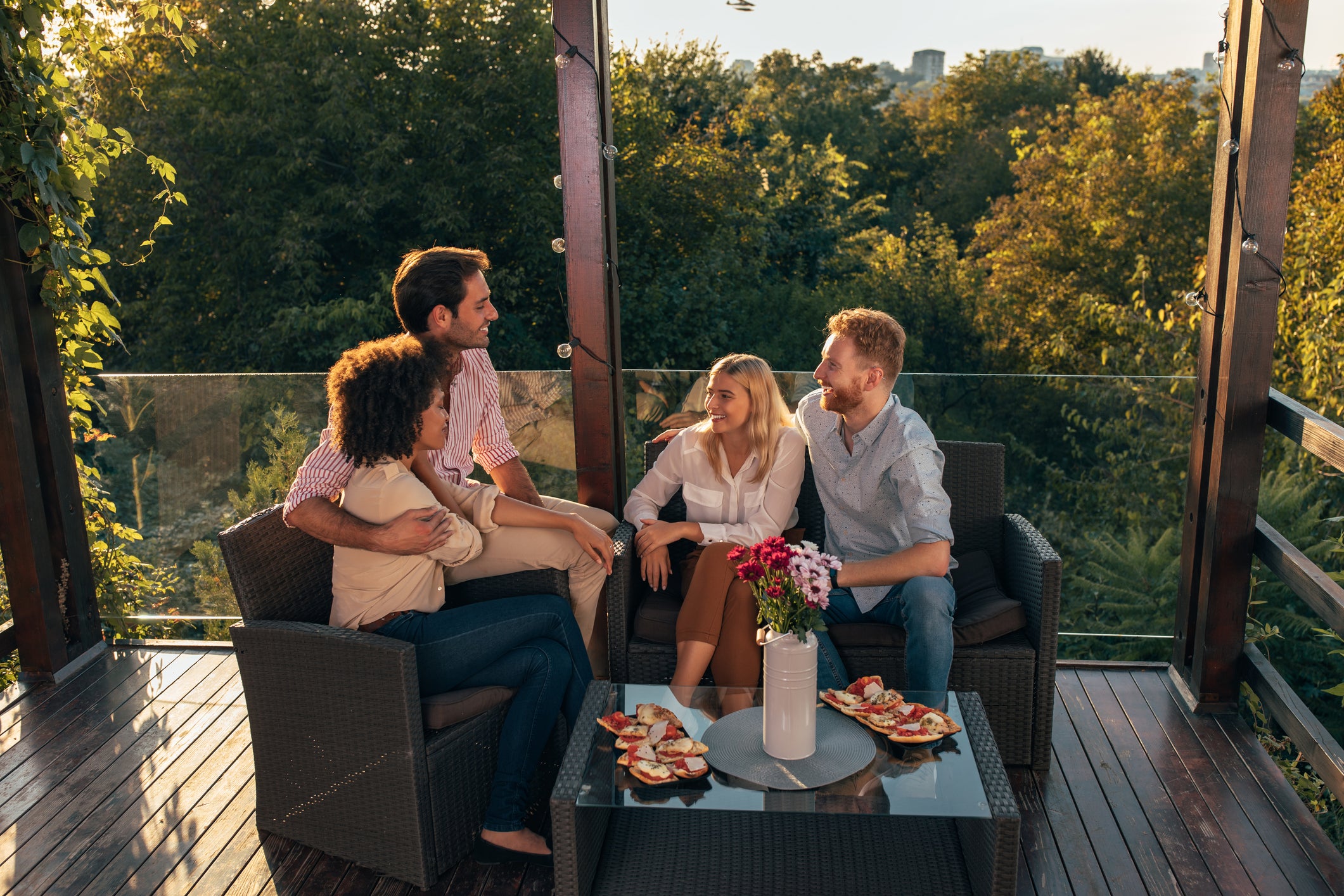 Friends sitting on a deck