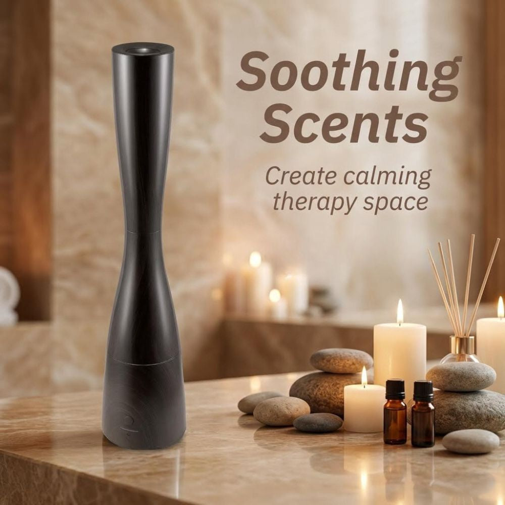 Micro Mist Tower Humidifier on a table with candles, stones, and reeds, promoting 'Soothing Scents'.