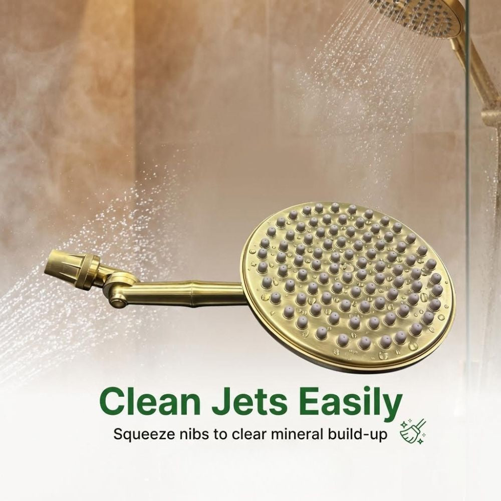 Gold shower head with cleaning jets instruction in a bathroom setting