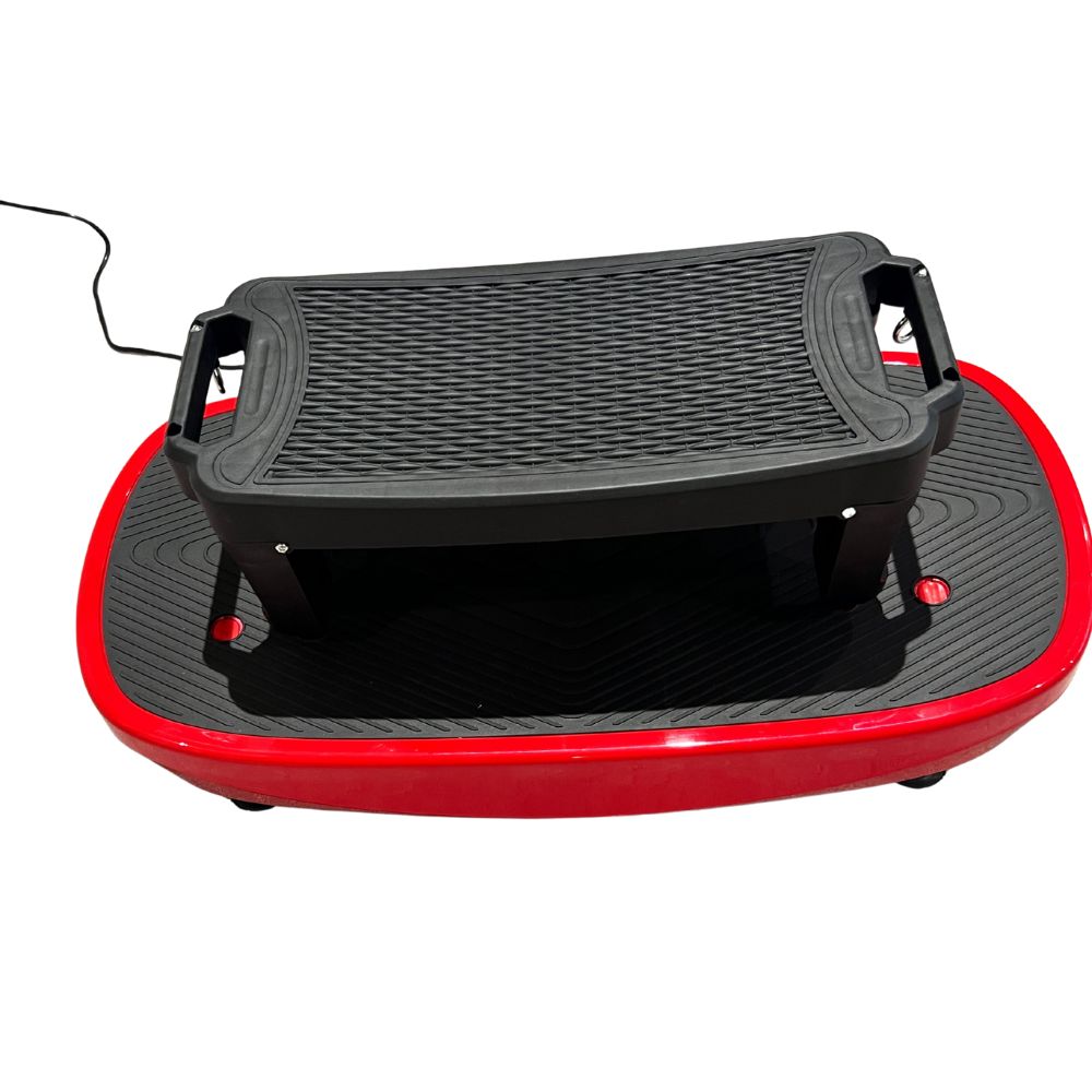 Red and black vibration plate on a white background