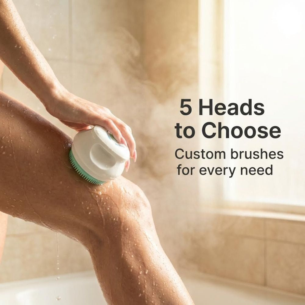 Person using a shower brush on their leg with text about customizable brush heads.