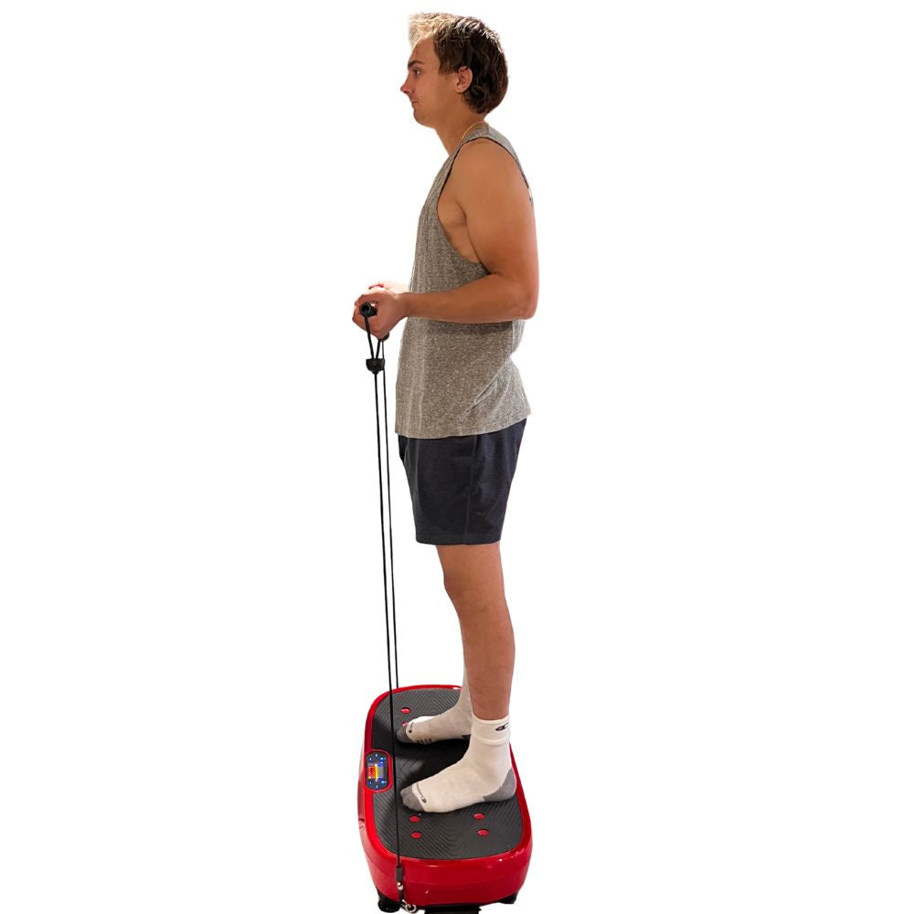 Person using a red and black Backplus Pro Fitness Platform vibration plate with resistance bands on a white background