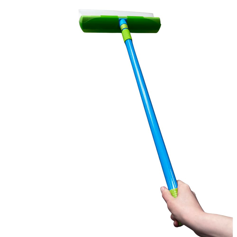 Hand holding a blue squeegee with green rubber blade on a white background