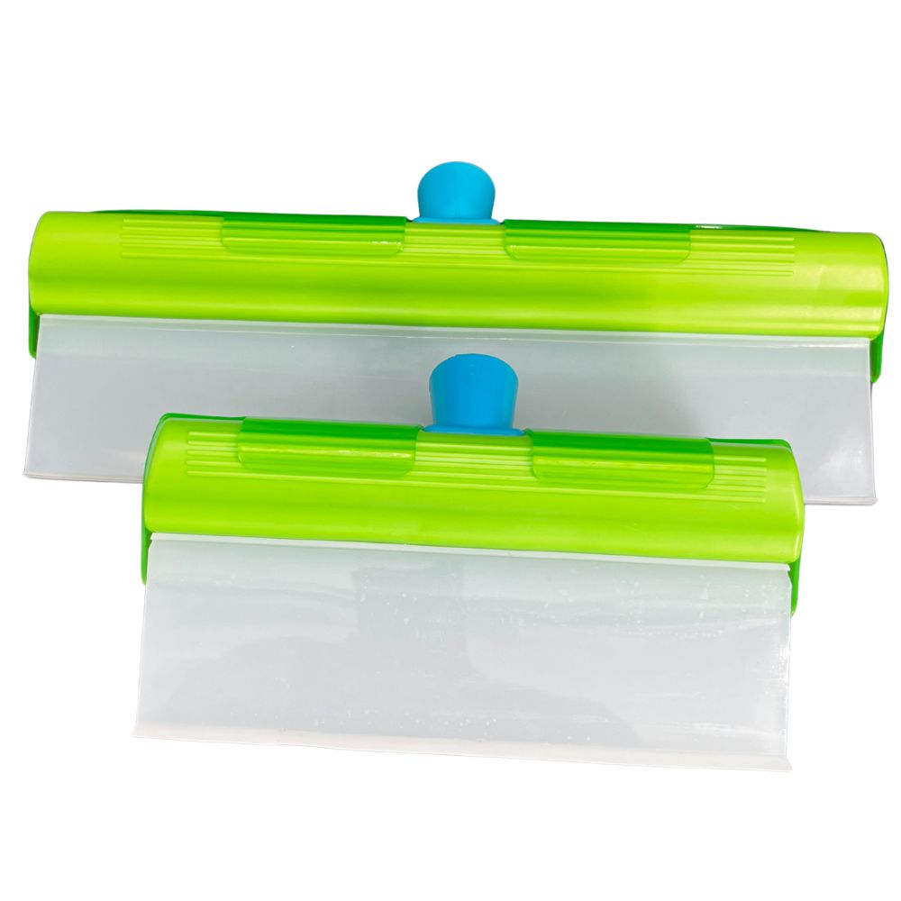 Two green squeegee tools with blue handles on a white background