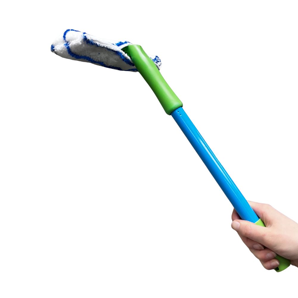 Window blade with blue handle and green extension, held by a hand on a white background