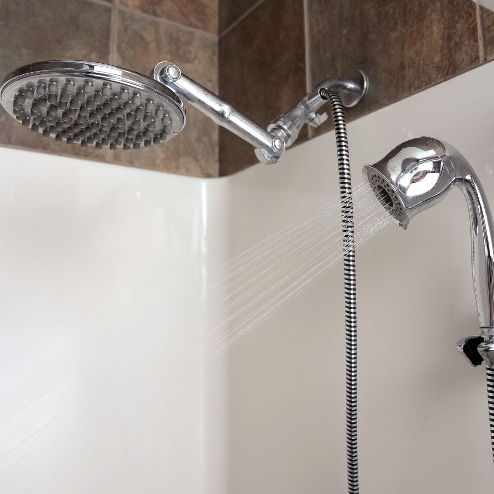 Chrome shower head and handheld shower attached to a hose on a tiled wall.