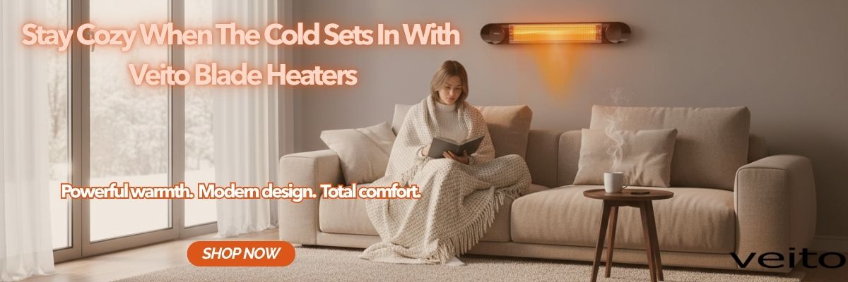 Woman reading a book on a couch with a Veito blade heater in the background