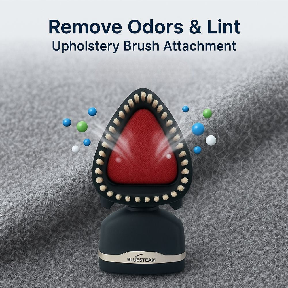 Upholstery brush attachment with red bristle head and black handle on a gray fabric background, featuring the Eurosteam brand.